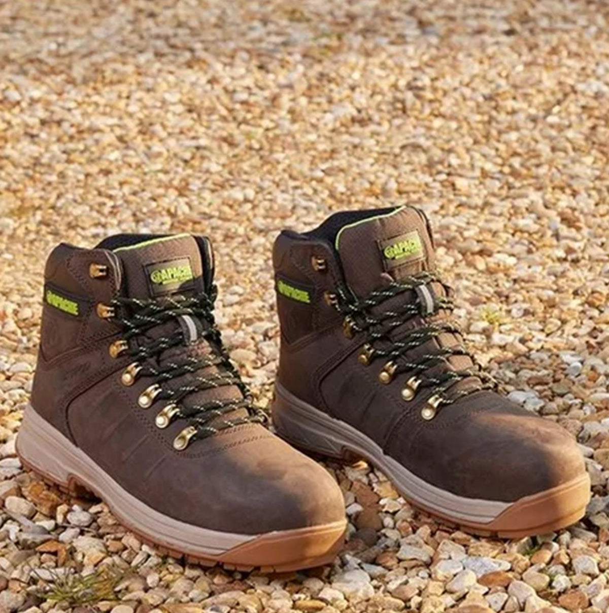 Apache MOOSE Unisex Boots Brown side view showing lace-up design and rubber sole, ideal safety boots for various conditions.
