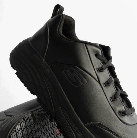Skechers MAX CUSHIONING ELITE SR-FILCH Mens Workwear Trainers Black side view showing sleek black design and lace-up closure.